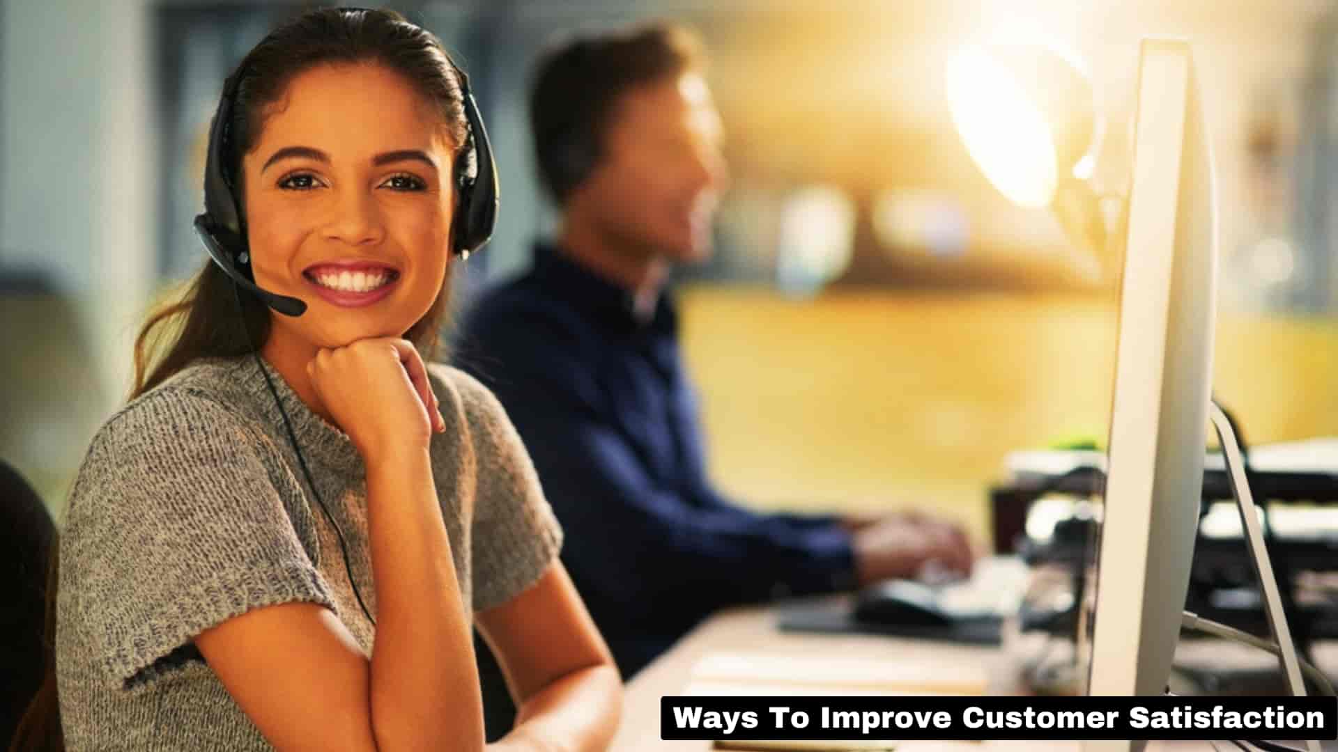 Woman employee in call center smiling